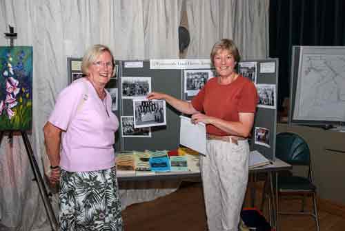 Sue Jourdan (right) and Stella Perceval manning a WLHS stand at an event in…